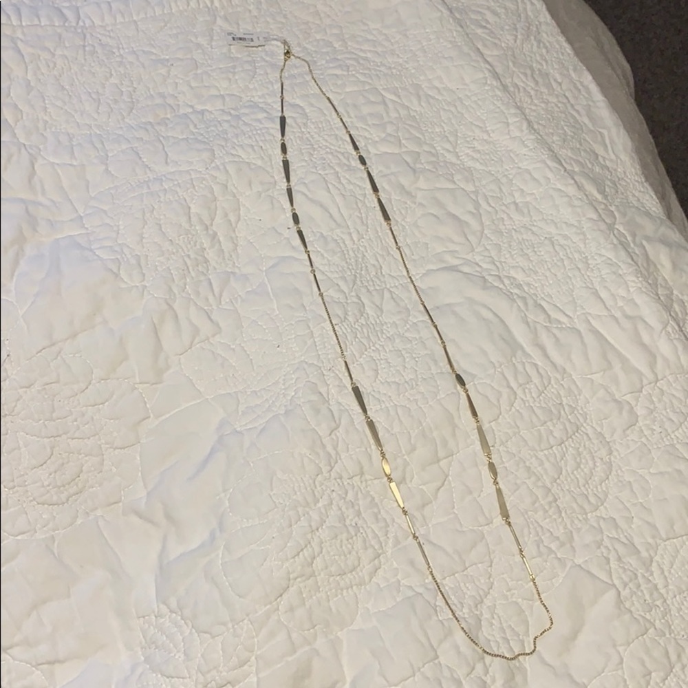 New Kendra Scott gold necklace with tag